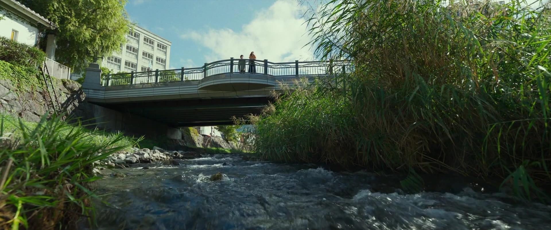 On the bridge.